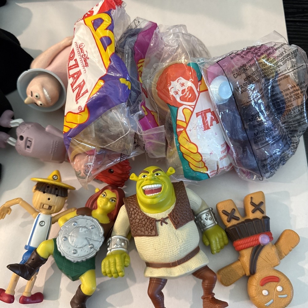 12 McDonald vintage disney toys -2007 Tarzan, Shrek, And More